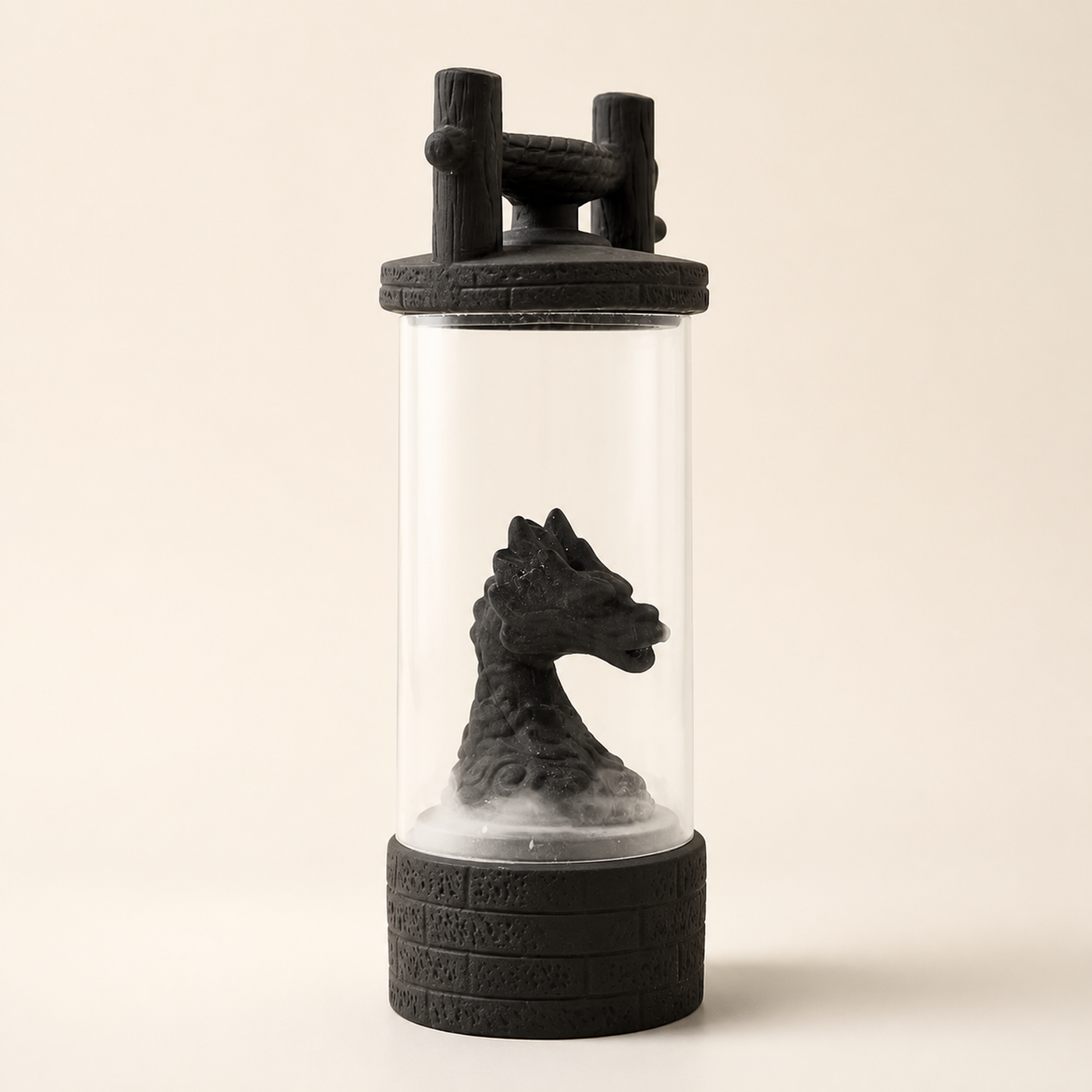 A hand-painted dragon backflow incense burner with smoke falling down the rock face