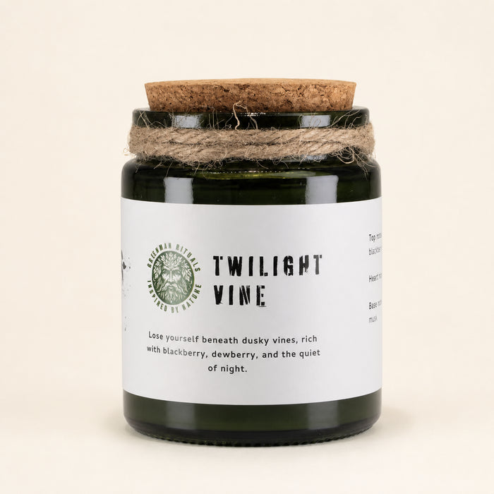 Twilight Vine woodwick soy candle in a green glass jar