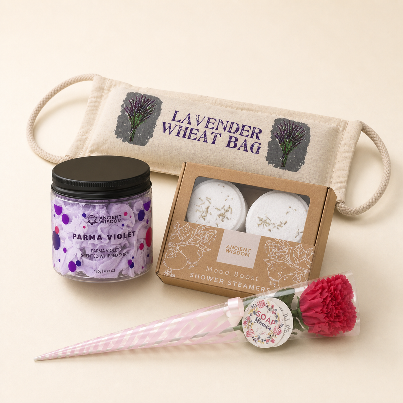 A Get Well Soon box, open, with a wheat bag, whipped soap and shower steamers